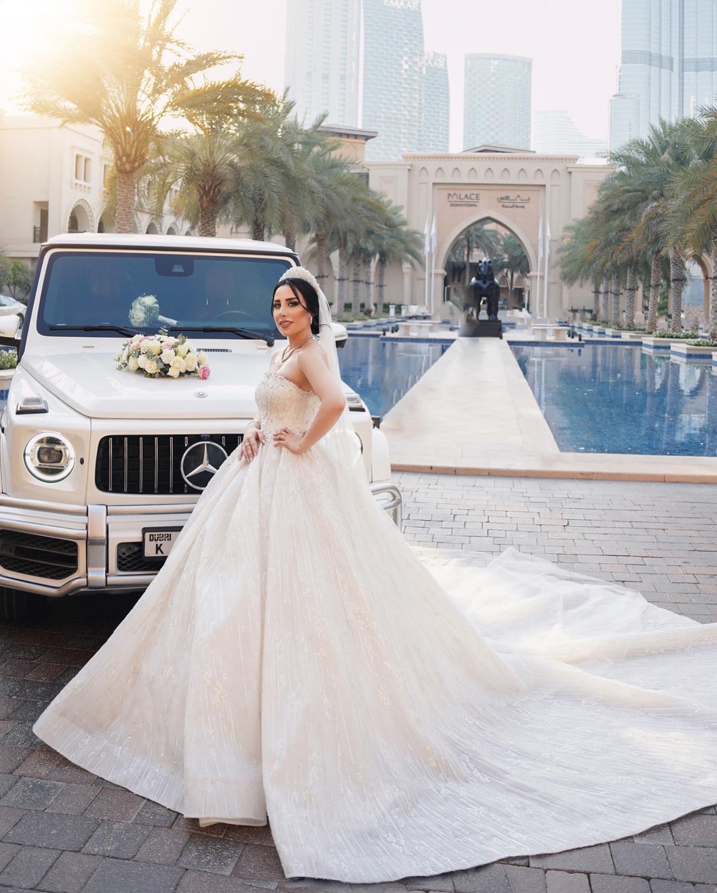 Happy brides wearing elegant wedding gowns from Sponsa Bridal UAE
